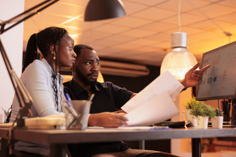 african american man and woman doing teamwork collaboration